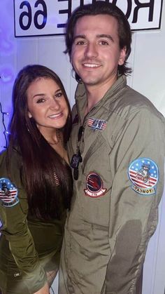 a man and woman are posing for a photo