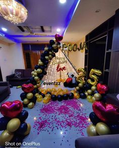 balloons and streamers decorate the entrance to an event