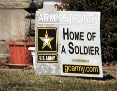 a sign that reads army strong, home of a soldier with a star on it