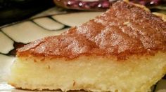 a piece of cake sitting on top of a white plate