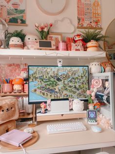 a desktop computer sitting on top of a desk next to a keyboard and mouse in front of a clock