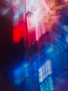 blurry photograph of colorful lights in a building