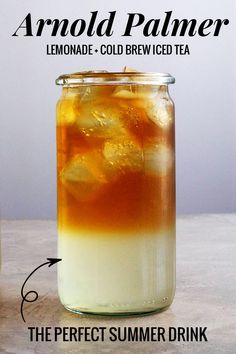 an iced drink in a jar with lemonade and cold water on the side, labeled