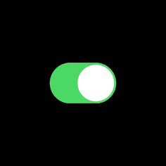 an image of a green button on a black background