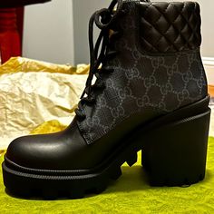 This Is An Authentic Pair Of Gucci Apollo Calfskin Gg Supreme Nappa Samoa Quilted Lace Up Ankle Boots Size 37 In Black. These Women's Boots Are Made Of Quilted Black Calfskin Leather And A Monogram Coated Canvas. These Boots Feature A Round Toe And A 3.5 Inch Heel. Condition: New With Tags, Unworn Size: 37 (7.5), 1 In Platform, 3 In Heel, 5 In Ankle Shaft Comes With: Shoes, Individual Dust Bags, Original Gucci Embossed Boxing Original Price: $1200 Before Tax Excellent Holiday, Birthday, Or Anniv Gucci Designer Boots With Reinforced Heel, Gucci Luxury Boots, Designer Gucci Boots With Branded Insole, Gucci Black Ankle Boots, Black Gucci Luxury Heels, Gucci Black Round Toe Boots, Gucci Black Boots With Reinforced Heel, Designer Black Boots With Reinforced Heel, Luxury Black Boots With Reinforced Heel