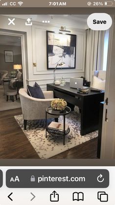 a living room filled with furniture and a coffee table on top of a wooden floor