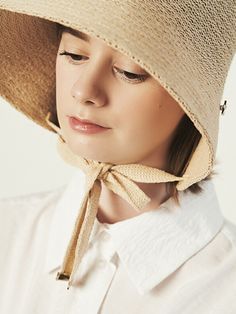 Editor's NotesELKE BLOEM's hat is lovely and perfect for daily wear.- Light-weighted- Eye-catching ribbon strap detail- Ideal sun shade for the face- Feminine and basic styleMeasurements(in.)- Size: One size.- Head Girth: 22.05in. ~ 23.62in.- Height: 5.12in.- Brim: 3.94in.Composition & Care- 65% Paper, 35% cotton- Avoid direct heat and moisture- Dry cleaning or hand wash is recommendedDesigner- by ELKE BLOEM Chic Beige Straw Cloche Hat, Adjustable Beige Sun Hat For Everyday, Beige Summer Straw Hat For Everyday, Chic Adjustable Solid Color Straw Hat, Adjustable Brimmed Casual Bonnet, Curved Brim Cloche Hat For Everyday Spring Use, Casual Adjustable Brimmed Bonnet, Spring Cloche Hat With Curved Brim For Everyday, Wide Brim Hat With Adjustable Strap For Spring