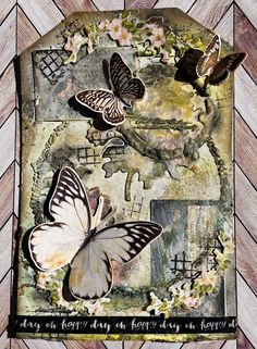 altered photograph of butterflies on wooden background