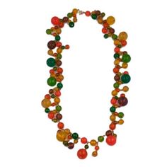 Long Bead necklace of bright fruit toned bakelite beads of different sizes circa 1960s. Many beads also dangle from the necklace. 
 Excellent condition
 Length: 30"
 Beads: 1/4" to 3/4" size Summer Bead Necklace, Long Bead Necklace, Bakelite Jewelry, Lucite Jewelry, Long Beaded Necklace, Accessories Jewelry Necklace, Bead Necklace, Shop Necklaces, Vintage Jewelry