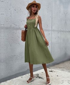 Our Lindsay Dress comes in an army green color in a relaxed fit. This summer must-have features a straight neckline with adjustable shoulder straps and decorative buttons down the front. This piece is perfect for throwing on for a comfortable and effortless casual spring and summer look. Size Guide: Melina is 5'6"tall, and has a 33.5"bust,24.8"waist,&37.4"hips. She is wearing a S / US 4 / AU 8. This dress is true to size. Material: 65% Linen, 35% polyester Feature: Midi length. Relaxed fit. Stra Linen Chic, Plus Size Cosplay, Short Lace Dress, Printed Long Dresses, Straight Neckline, Suspender Dress, Decorative Buttons, Knee Dress, Casual Spring