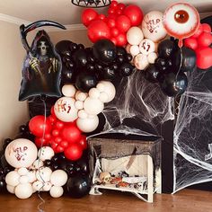 halloween decorations and balloons are on the floor