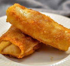 two fried food items on a white plate