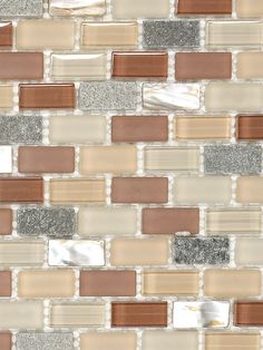 a close up view of a mosaic tile wall