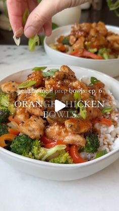 a bowl filled with chicken, broccoli and rice