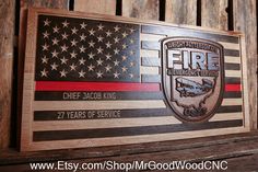 a fire department sign with an american flag on it