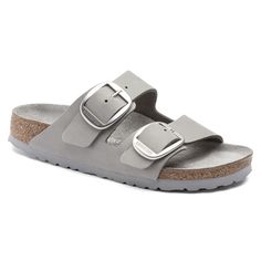 The legendary two-strap design from BIRKENSTOCK with an amplified buckle accent - the Arizona Big Buckle. This version features a large elegant buckle creating a bold yet minimalist design. Shown in nubuck leather. Anatomically shaped cork-latex footbed Upper: nubuck leather Footbed lining: suede Sole: EVA Details: two straps each with an individually adjustable metal pin buckle “Made in Germany” Modern Silver Sandals With Buckle Closure, Modern Double Strap Footbed Sandals With Adjustable Strap, Modern Leather Footbed Sandals With Tang Buckle, Modern Leather Slides With Buckle Closure, Modern Adjustable Footbed Sandals With Buckle Closure, Classic Double Strap Footbed Sandals With Buckle, Classic Double Strap Footbed Sandals With Adjustable Strap, Silver Open Toe Slides With Buckle Closure, Silver Open Toe Slides With Buckle