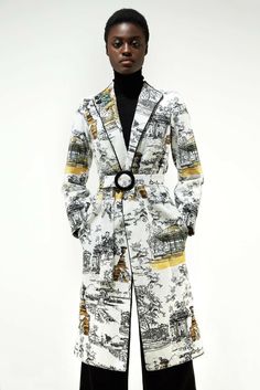 Impeccable crafted with elegance and modernity. This white printed mid-weight topcoat took its name from the gardens of Paris. The bold but romantic fabric is carefully cut to reflect the art of the print. The officer collar has front closure with two press fasteners while there is an additional belt for fastening at waist. Cut for a tailored fit, this style is designed with structure shoulders and an outline piping in a long line shape with deep side pockets. The interior is fully lined, expert Be Bold, Top Coat, Concept Store, Piping, Greece, Paris, Wardrobe, Collar, Fabric