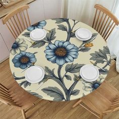 a dining table with blue flowers on it