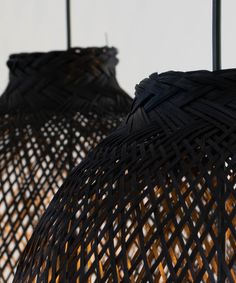 two lamps that are made out of wicker