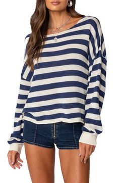 Lightweight  and relaxed, this sweater ringed in bold stripes sports a dramatically oversized fit that slouches like an old favorite. Boat neck Long sleeves with ribbed cuffs 90% cotton, 10% polyester Machine wash, dry flat Imported Chino Pants Women, Wwe T Shirts, Oversized Striped Sweater, Sweater Oversized, Sweater Oversize, Girls Blouse, Bold Stripes, Striped Sweater, Striped Knit