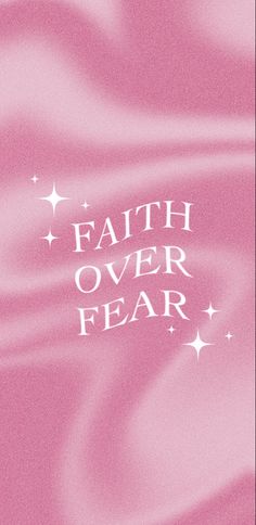 a pink book cover with the words faith over fear written in white letters on it