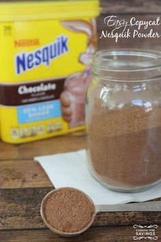 a glass jar filled with brown sugar next to a carton of nestil powder