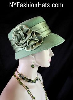 Dusty Lime Sage Green Winter Wool Designer Satin Rosette Bow Women's Fashion Hat. The Small Brim Tilts Downward On This Classic Styled Dress Hat. A Satin Band Encircles The Crown Of This Simple Yet Very Elegant Dress Hat.  This Stylish Wool Hat Can Also Be Work As A Casual Statement Piece. This Statement Hot Green Satin Hat Is Custom Made And Designed By NY Fashion Hats Couture Millinery Headwear Apparel. This Hat Is Suited For Weddings, Brides, Mother Of The Bride, Church, Temple, Sabbath, Form Hats Ny, Winter Wool Dress, Brides Mother, Hot Green, Bridal Hat, Women Hats Fashion, Bow Women, Dress Hat, Designer Hats