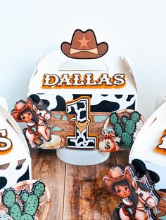 the birthday cake is decorated with cowboy theme