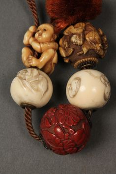 Asian Ojime beads, strung as a necklace, most carved ivory but also including cinnabar, nut, bone, stone and wood examples. Early 20th century. Ojime Beads, Carved Ornaments, Art Appliqué, Wood Carving Designs, Carving Patterns, Carving Art, African Trade Beads, Wood Carving Patterns, Wooden Figurines