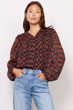 Refresh your fall wardrobe with this stylish printed blouse by EVEREVE. Finished in semi-sheer fabric, this flowy silhouette features long puff sleeves, ruffled seams, and a split neckline with a covered button. Take it from day to night with jeans or vegan leather pants. Note: This top is unlined. Cami not included. Vegan Leather Pants, Fashion 101, Long Puff Sleeves, Sheer Fabric, Fall Shopping, Tee Dress, Medium Brown, Sheer Fabrics, Fall Wardrobe