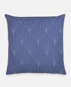 a blue pillow with white lines on it