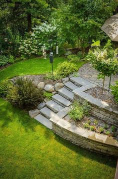 an outdoor garden with steps and landscaping