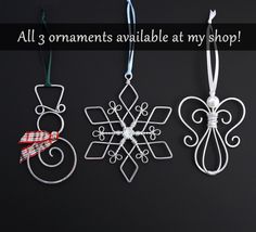 three ornaments are hanging on a black background with the words all 3 ornaments available at my shop