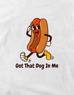 a white t - shirt with a cartoon hot dog running and the words got that dog in me printed on it