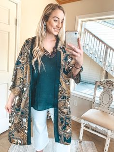 This beautiful kimono is one sure way of staying in style! This classic look is perfect for all occasions, such as work, weddings, and cruises! This kimono includes a flowy 3/4 sleeve and body, a beautiful baroque print on a black background, and a black trim. Pair this with gold jewelry and you'll be set. Josie is a size 6 wearing the O/S. Abby is a size 14 wearing the O/S. Size Suggestions: One Size: 2-20 Fabric Content: 100% Polyester Care Instructions: Hand wash, cold. Do not bleach. Hang to Beautiful Kimono, Baroque Print, Giddy Up Glamour, Beautiful Kimonos, Print Kimonos, Rich Fabric, Staying In, Black Trim, Cruises