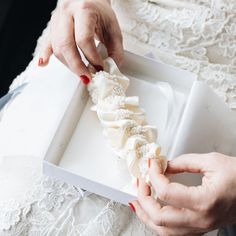 The one and only! Detailed with a peek-a-boo bow in the back for only the most classic of brides and delicate ivory, pearl-like beads throughout the design, this wedding heirloom is timeless in every way. Our 'Aisle Always Love You' style wedding garter is the perfect heirloom to meet your match at the end of the aisle. Details Production Shipping Sizing Main Garter: Light ivory satin background with a stripe of ivory pearl-like beaded trim with an oversized ivory satin bow with short tails tied Elegant Bridal Accessories With Satin Bow, Elegant Satin Bridal Accessories For Wedding, Elegant Bridal Belt With Satin Bow For Wedding, Elegant Adjustable Bridal Accessories, Pearl White Bridal Accessories For Wedding, Pearl White Bridal Pearl Accessories For Wedding, Elegant Adjustable Bridal Accessories For Wedding, Adjustable Pearl Bridal Accessories For Wedding, Elegant Adjustable Bridal Accessories For Marriage