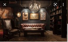 a living room filled with furniture and a chandelier