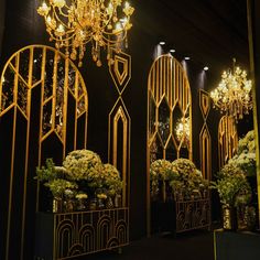 an elaborately decorated room with chandeliers and flowers