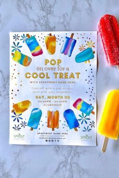 two popsicles and an ice cream bar on a marble counter top with the title pop on over for a cool treat