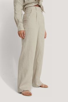 Linen Wide Leg Pants Beige | na-kd.com Linen Wide Leg Bottoms With Belt Loops, High-waisted Linen Cargo Pants, High Waist Linen Bottoms With Belt Loops, High Waisted Linen Bottoms With Belt Loops, Linen Straight Leg Bottoms With Belt Loops, Straight Leg Linen Bottoms With Belt Loops, Linen Bottoms With Belt Loops And Straight Leg, Wide Leg Pants Beige, Linen Wide Leg Pants