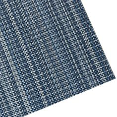 a blue and white rug with small squares on it's side, against a white background