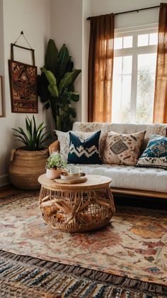 a living room filled with lots of furniture and plants on top of a rug in front of a window