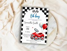 a birthday party card with a red car and balloons on the front, in black and white checkered paper