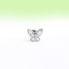 This Shiny Titanium Butterfly Stud is the perfect accessory for any butterfly lover! It's made from titanium, making it both durable and stylish. The shiny finish adds a touch of elegance, making it a must-have for any jewelry collection. Don't miss out on this beautiful piece! Detail： -Material: Titanium -Lightweight and sensitive skin friendly. -Gauge: 16g | 1.2mm-Post length: 8mm -Dimensions: 5.8mm Length x 7mm Width-Include: single item -Screw diameter: 0.8mm -Closure: internally threaded fl Hypoallergenic White Gold Butterfly Jewelry, Minimalist White Gold Butterfly Jewelry, Silver Butterfly Stainless Steel Jewelry, Minimalist Silver Butterfly Charm Jewelry, Minimalist Silver Jewelry With Butterfly Charm, White Gold Butterfly Ring Gift, Minimalist Silver Butterfly Jewelry, Fall Essentials, Belly Rings