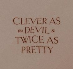 closeup of the back of a paper with writing on it that says clever as the devil and twice as pretty