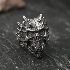 Flaming skull designs are quite trendy nowadays because of their unique look and symbolic meaning.... Black Gothic Stainless Steel Skull Ring, Black Ring For Halloween Streetwear, Gothic Black Skull Ring For Halloween, Black Skull Ring For Halloween Streetwear, Black Metal Skull Ring, Black Stainless Steel Skull Ring For Halloween, Gothic Silver Skull Ring, Gothic Black Rings With Skull Print, Gothic Skull Ring For Halloween