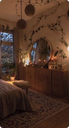 a bedroom decorated with plants and candles