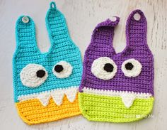 two crocheted bags with googly eyes and mouths on the handles are shown