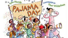 an image of a group of people with a sign that says pajama day