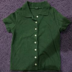 Short Sleeve Collared Button Up Top And Opaque Buttons. Fabrics: 100% Cotton Measurements: 16" (41 Cm) Length, 15" (39 Cm) Bust Made In: China Nwot Green Collared Top With Snap Buttons, Green Button-up Top With Buttons, Classic Collared Tops With Button Closure, Fitted Green Top With Button Cuffs, Fitted Green Tops With Button Cuffs, Classic Button-up Tops With Buttons, Vintage Collared Tops With Buttons, Vintage Collared Button Tops, Retro Top With Buttons